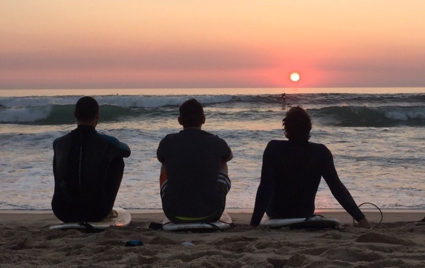 Surfers with surfboards in Cagliari